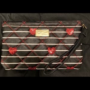 USED ONCE LIKE NEW LUV BETSEY WRISTLET
